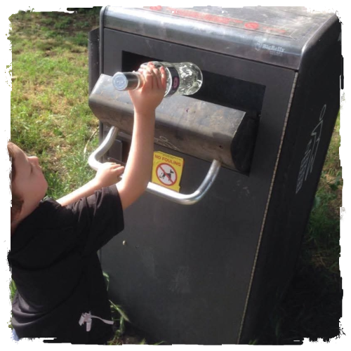 Tyler puting rubbish in the bin